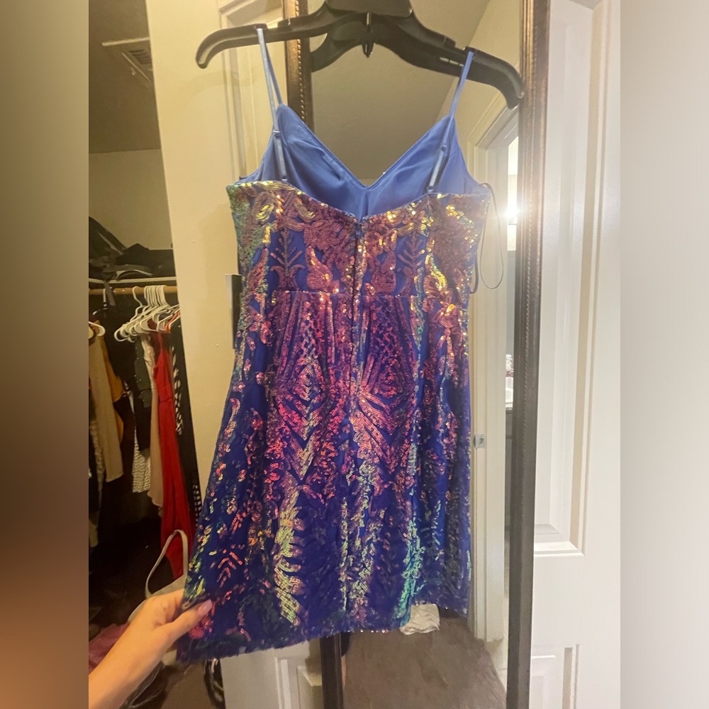 Bought from Dillards sequin dress size 3 brand is city vibe.